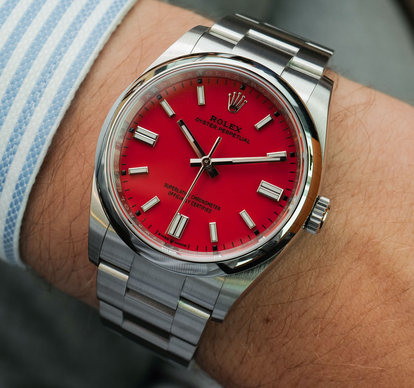 silver rolex with red face